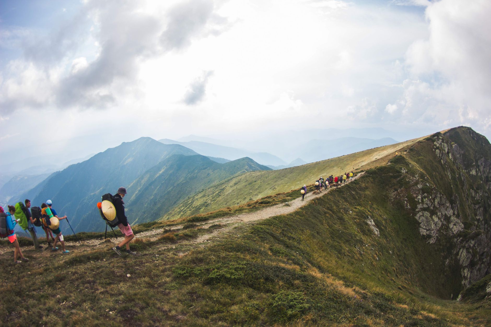 Small expedition group walking silent ridge